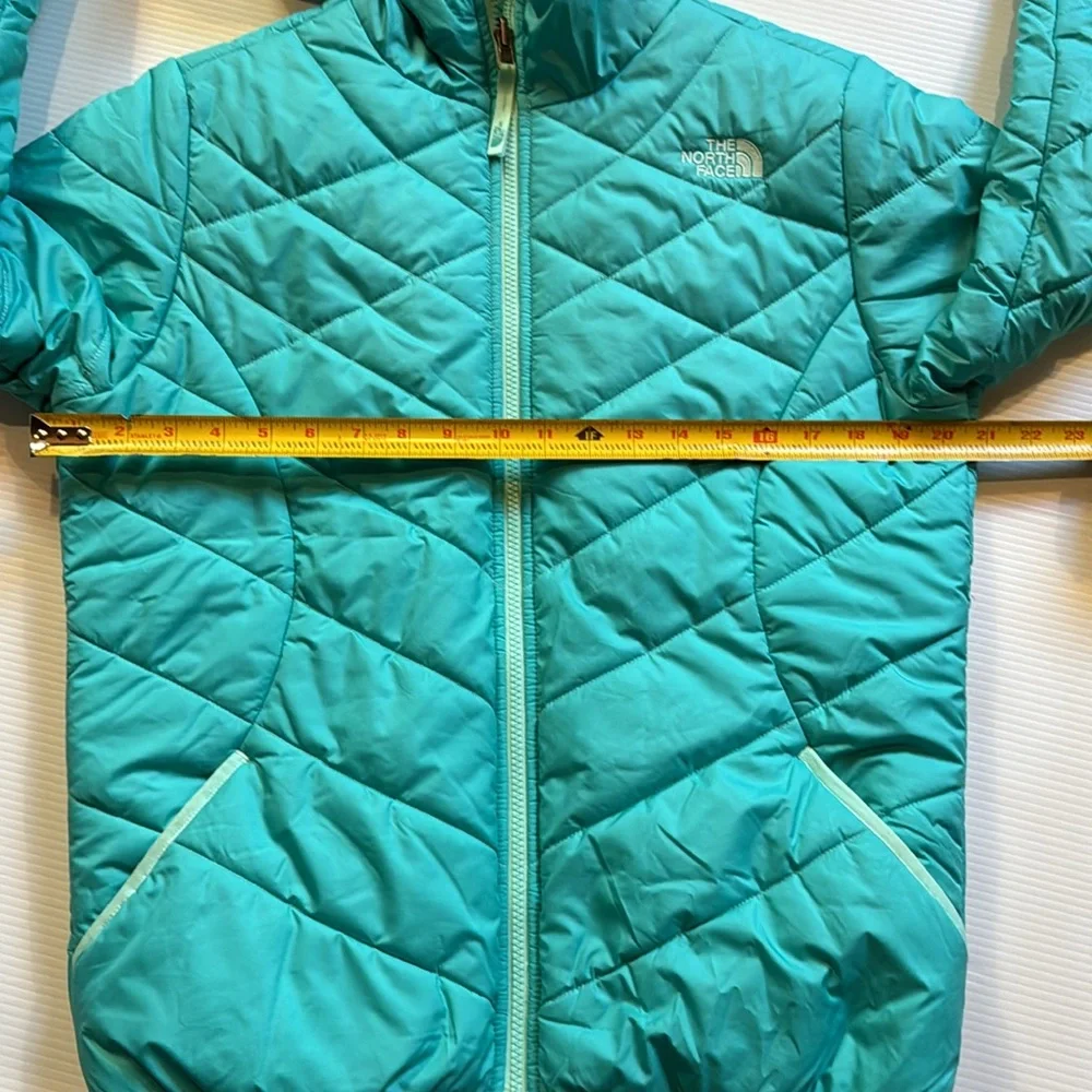 The North Face reversible puffers jacket.  Green, yellow, white swirl. Girls XL
